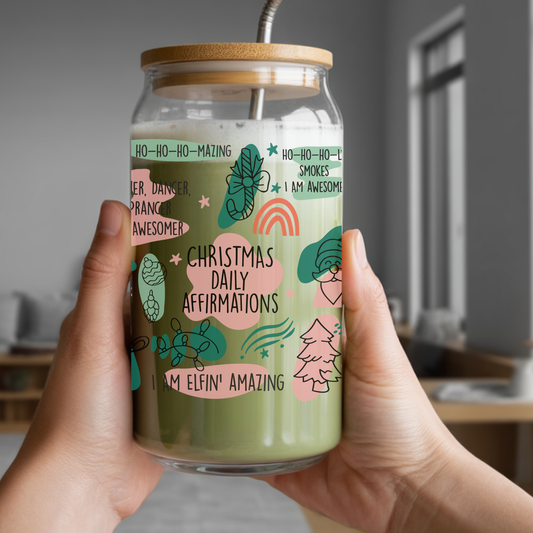 Jar with a festive label and straw, held by hands in a room setting