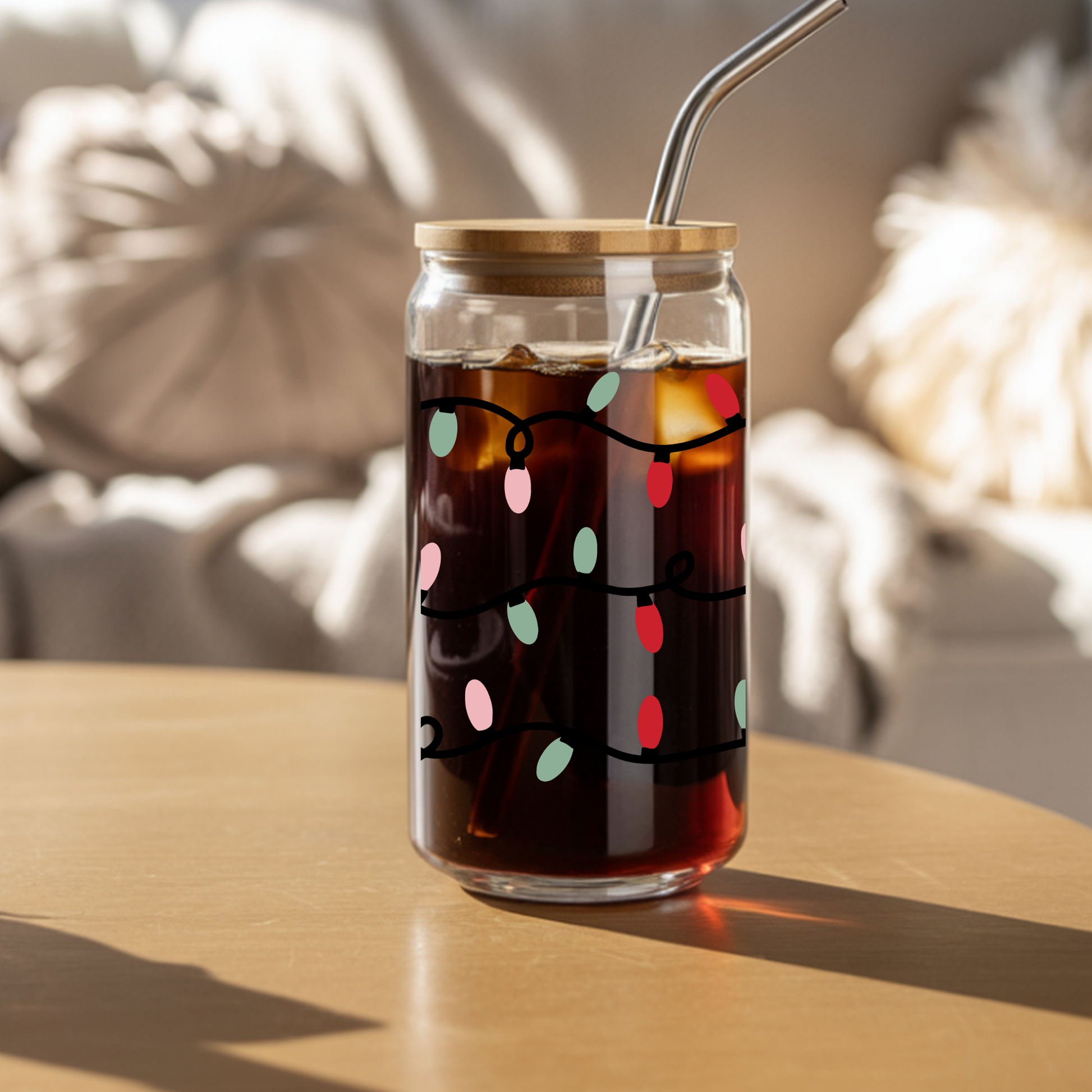 Glass tumbler with a wooden lid and metal straw on a wooden surface, containing a dark liquid with colorful lights.