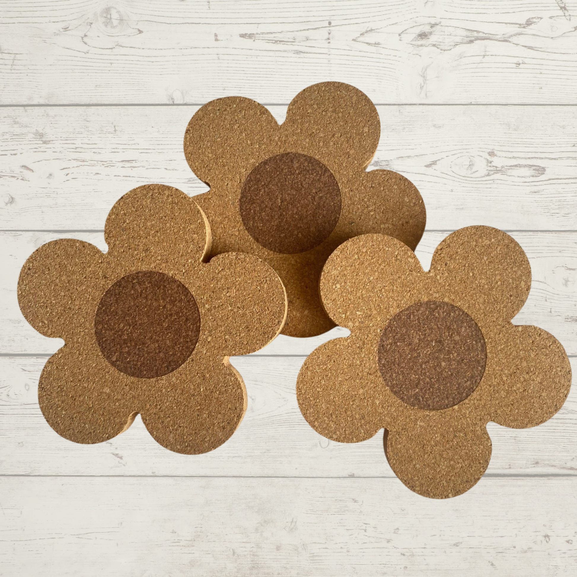 Beautiful Design: Features flower patterns. Eco-Friendly: Made from natural cork material. Protective Surface: Guards your table against spills and scratches. Durable and Absorbent: Long-lasting and absorbs moisture effectively. Easy to Clean: Simple maintenance with a quick wipe.