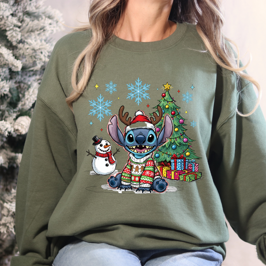 Person wearing a green sweatshirt with Christmas-themed design featuring Stitch and a snowman.